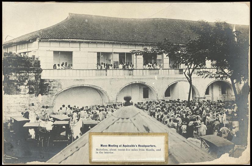 Mass-meeting at Aguinaldo’s headquarters, Malorless [Malolos], about twenty-five miles from Manila, and in the interior.