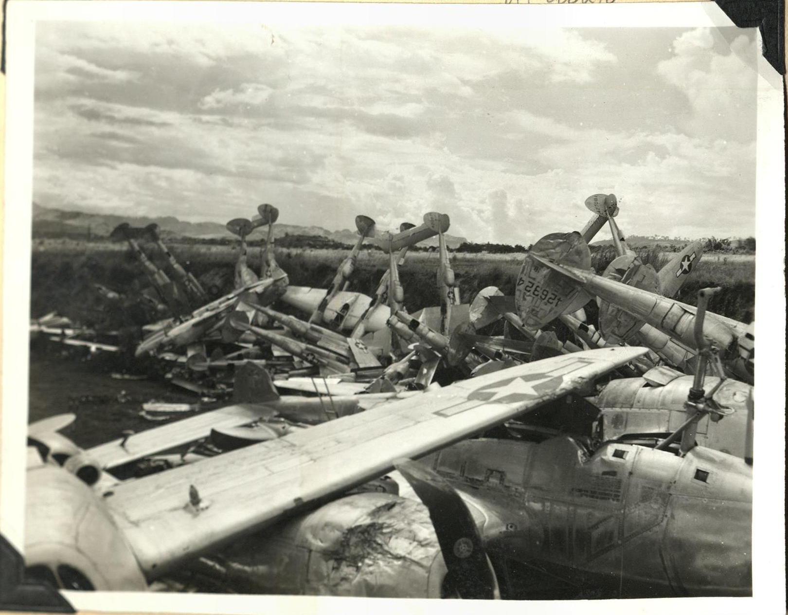 Destroying planes [Lockheed P-38 Lightnings], Clark Field.