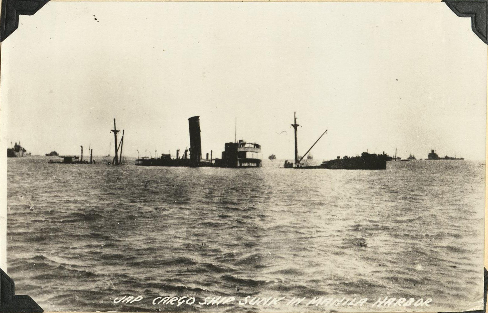 Jap [Japanese] cargo ship sunk in Manila harbor.