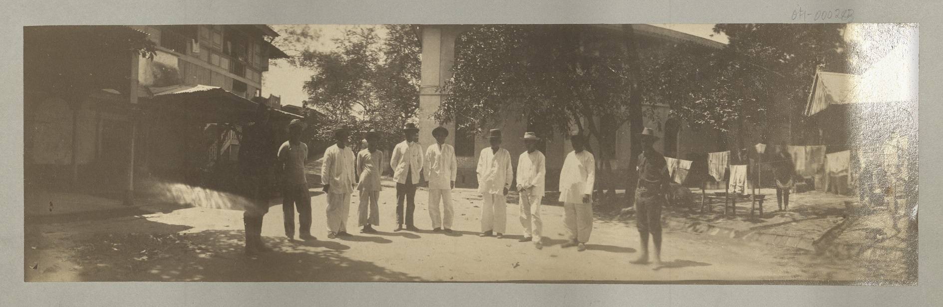 [Untitled – Group photo of Filipinos with U.S. soldiers, Intramuros?]