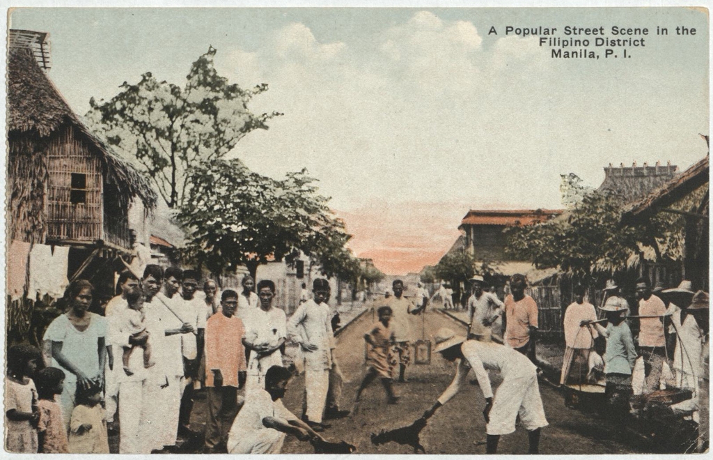 A popular street scene in the Filipino district, Manila, P. I.