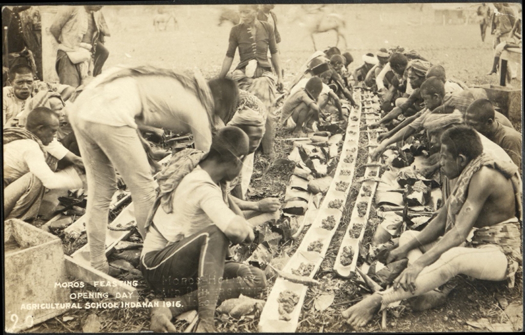Moros feasting – opening day – 
Agricultural School Indanan 1916.