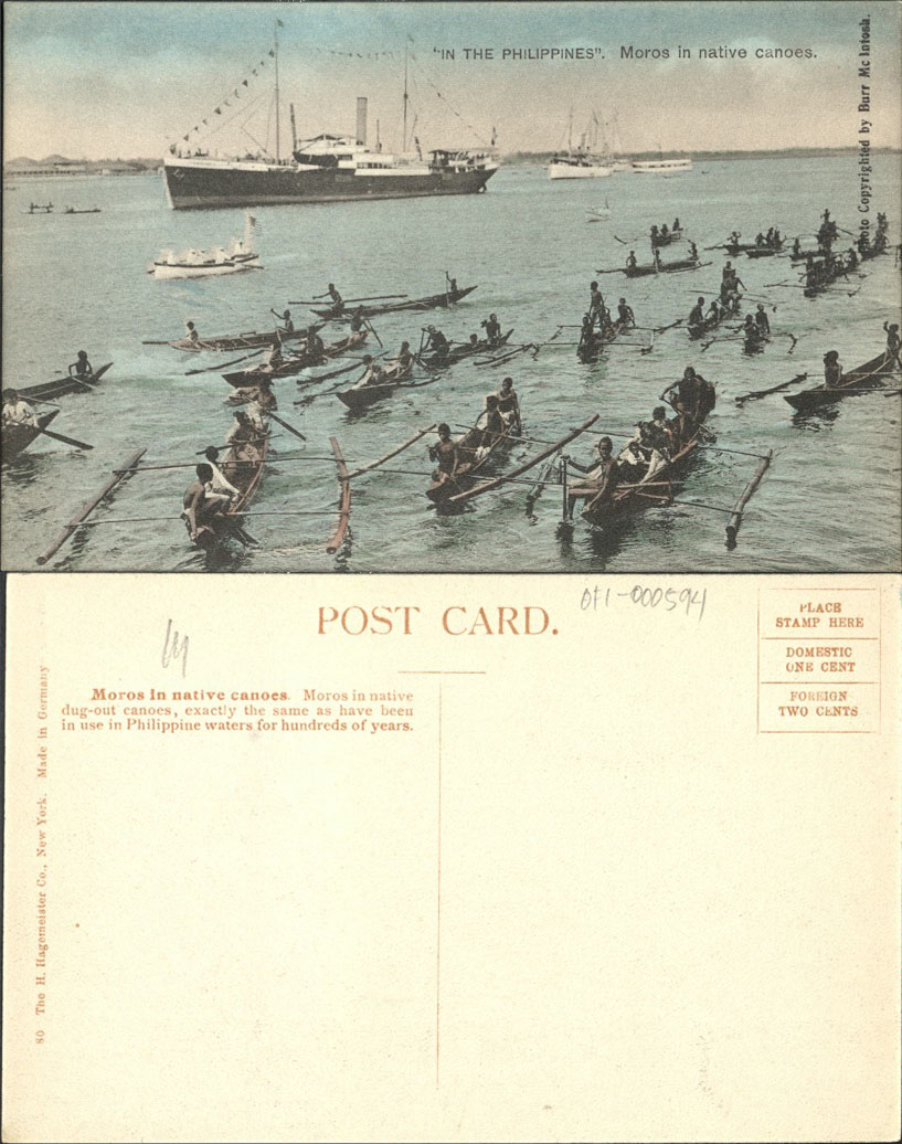 �IN THE PHILIPPINES�. Moros in native canoes.