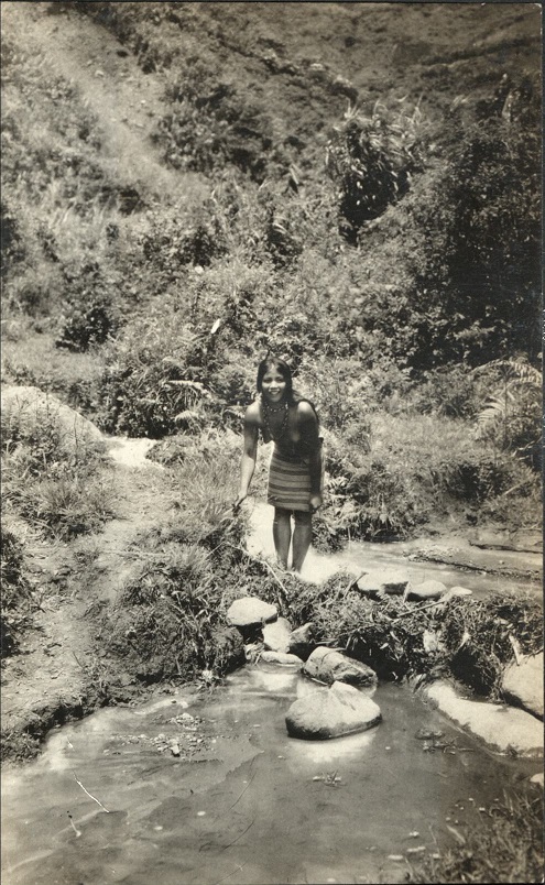 [Untitled – Young indigenous women by a creek].