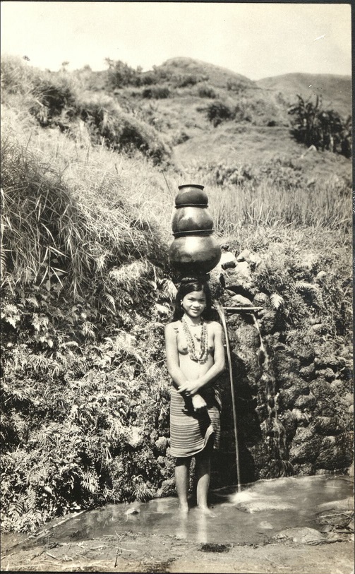 [Untitled – Young indigenous women filling water pots].