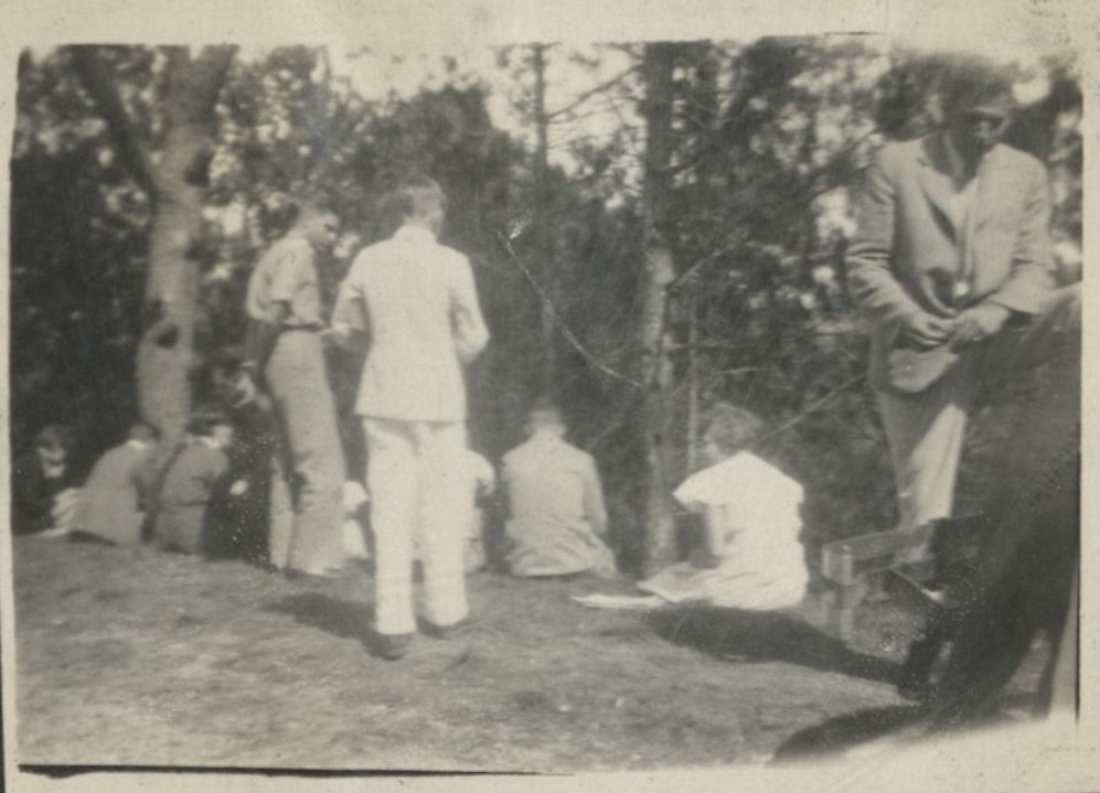 On the bank at recess [Brent School, Baguio].