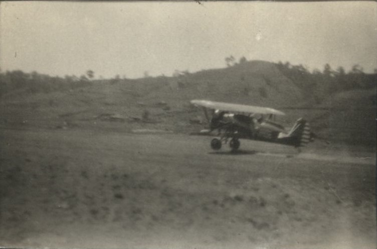 Army pursuit plane landing [Baguio].