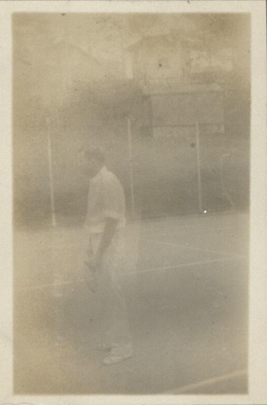 Mr. Bull [F. Guyon Bull] on the Camp John Hay tennis court.