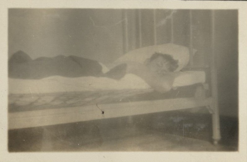 Jim [Stapler] in bed at the mess in Antamok [Benguet].