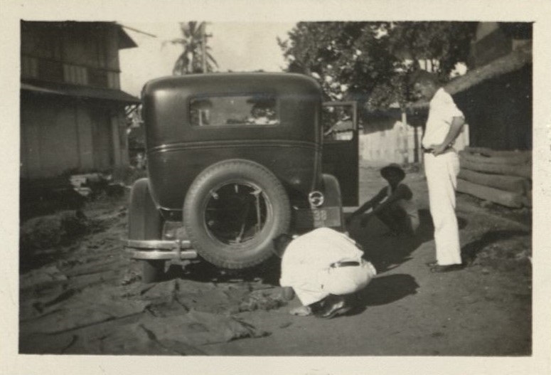 Changing a tire in Ligao [Albay].