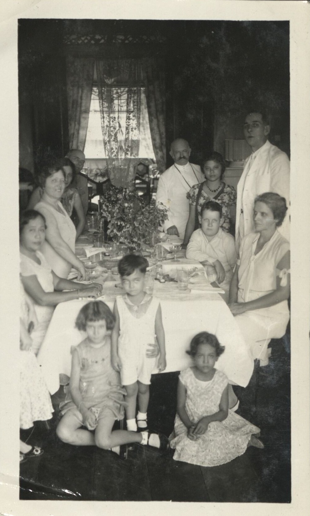Dad [Harry Hawkins, Sr.], mother, and Bob  [Hawkins] at Mrs. Rocos in Legaspi.