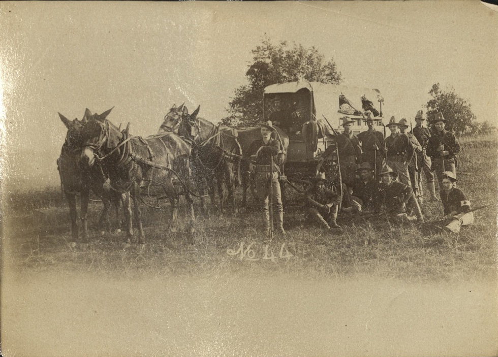 No. 44 [U.S. soldiers posing with horses and cart].