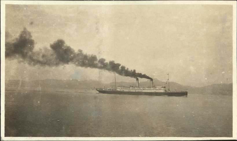 [Untitled – Japanese-flag steamship cruises through strait].