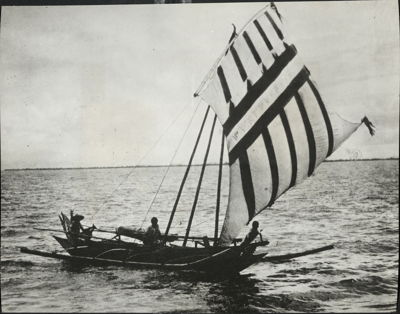 1. PHILIPPINES: Moro fishermen in their vinta (boat) which is a double-rigged one. All sails are differently designed, and have symbolic meaning. E – 276.