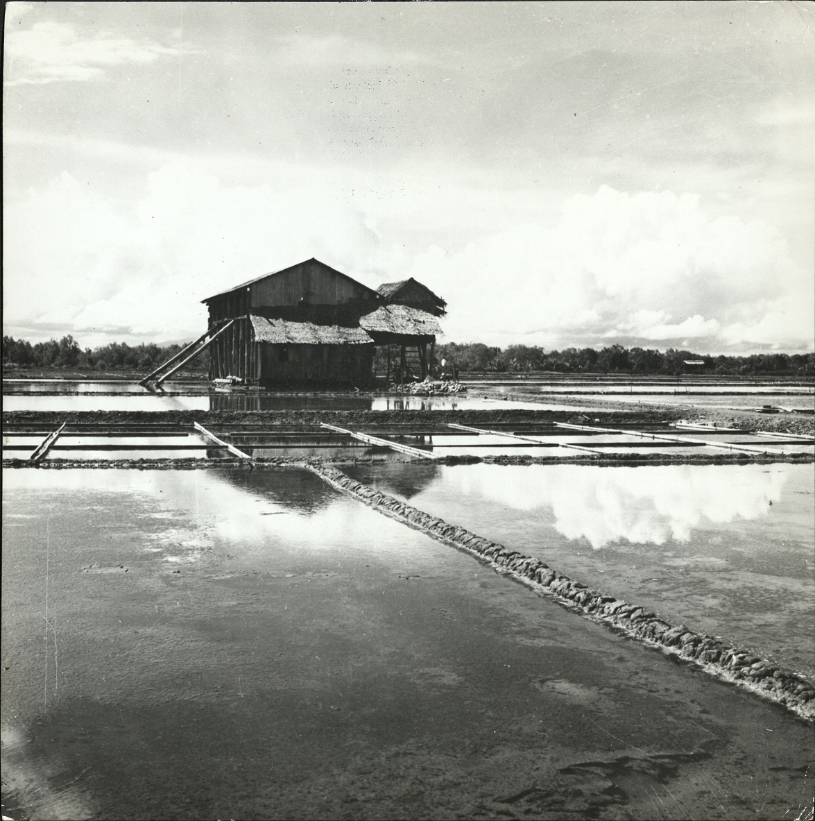 36. PHILIPPINES, Zamboanga: Salt beds with warehouse in the rear. E 1214.