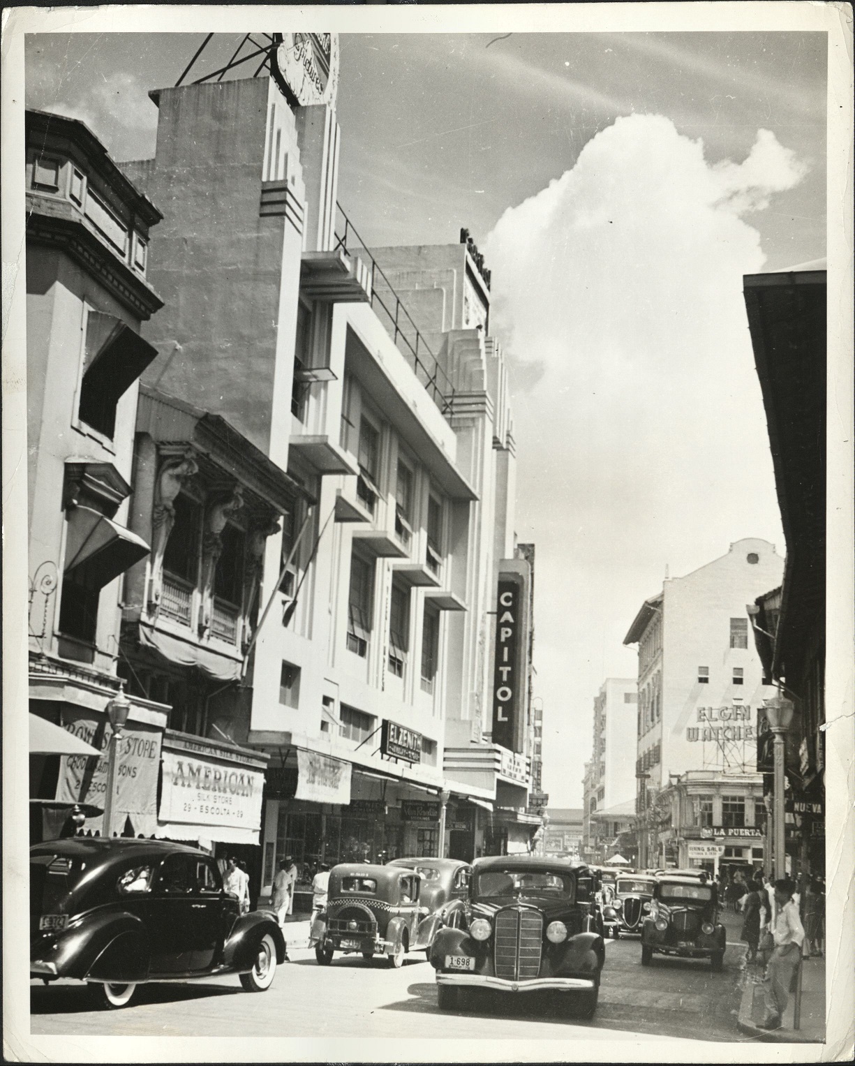 [Caption missing – Escolta Street, Manila, with Capitol Theater].
