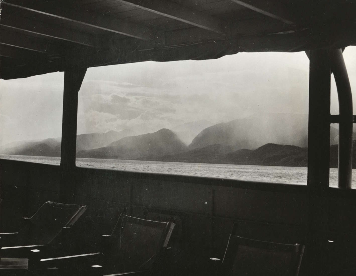 128. PHILIPPINES: Western coast of Mindanao from the sea. Heavy rain is in the coastal mountains.