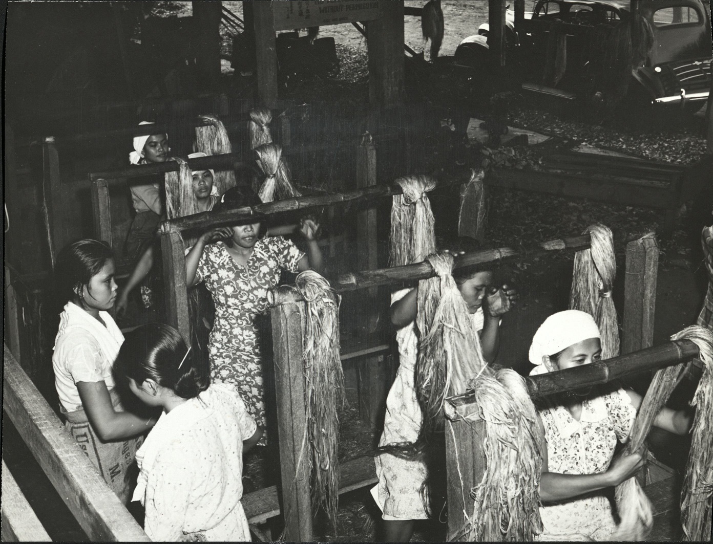 29. PHILIPPINES – Hemp: Women at work in hemp warehouse.