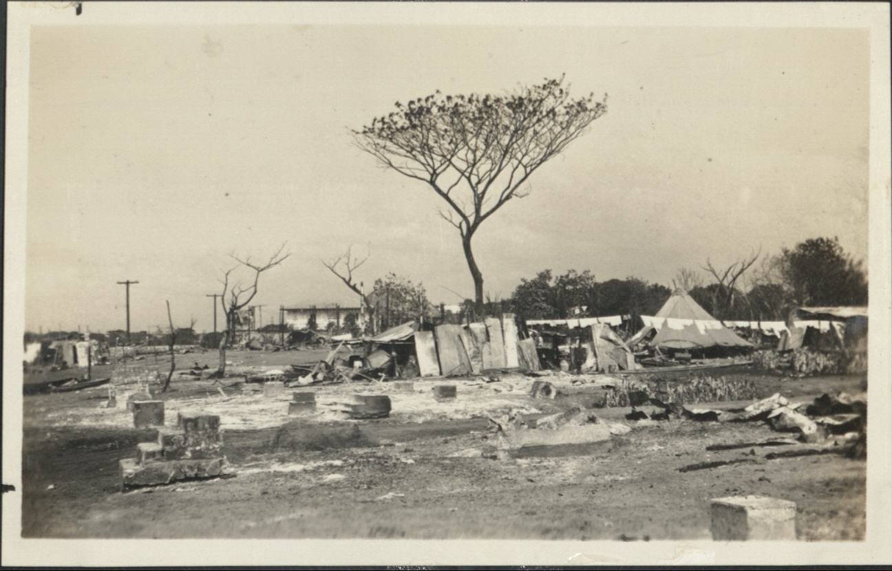 Army relief tent and refugee shelter. (Scenes on this page taken immediately after the fire which entirely devastated Pasay District and rendered many homeless).