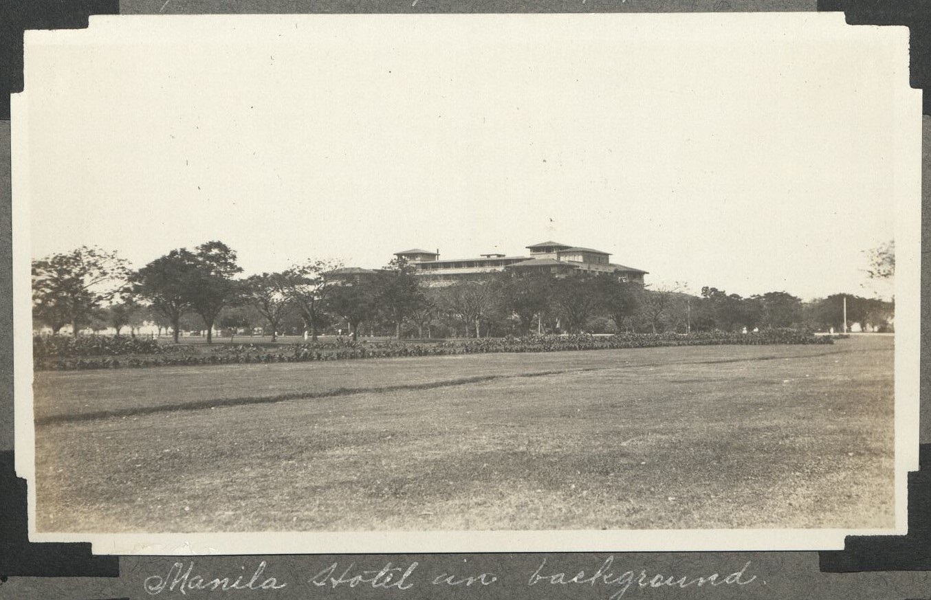 Manila Hotel in background.