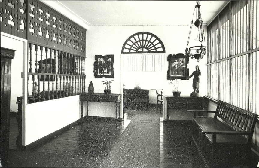 Balustrades and filigreed panels, and a gallinera for the pet rooster [Museo ng Buhay Pilipino].