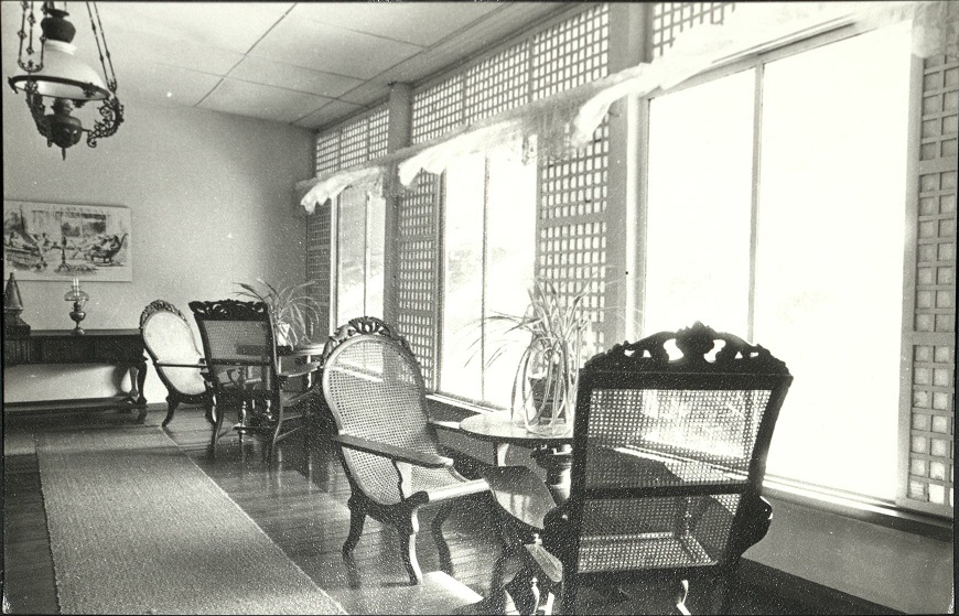 Window-side view: Butaka lounging chairs, capiz window panes, and a lazy afternoon {Museo ng Buhay Pilipinas].