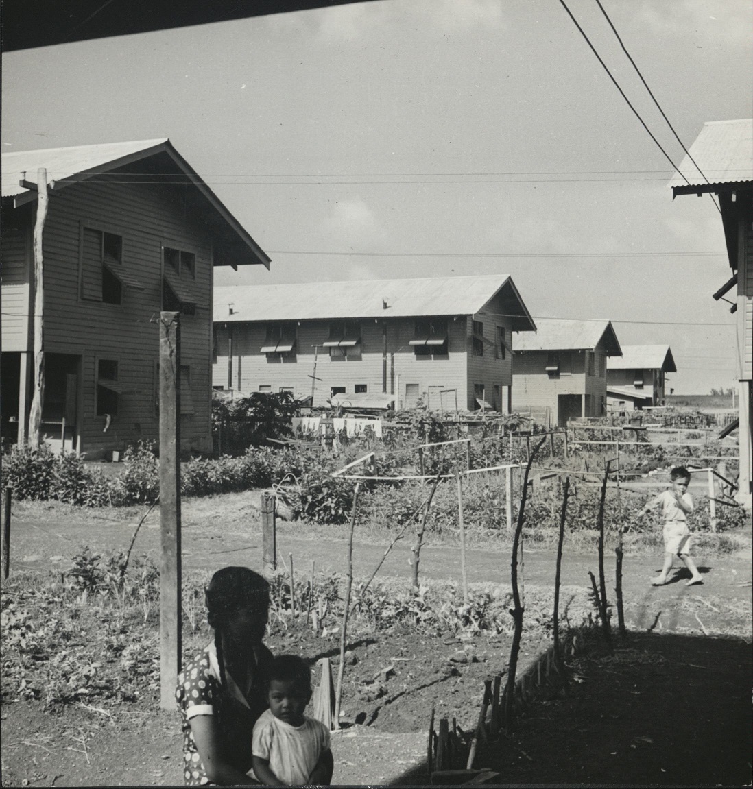 Manila, one of the most modern cities of the East. Newly-opened garden apartments in Manila. The construction is required by the government and there are rows of cheap flats for the middle class.