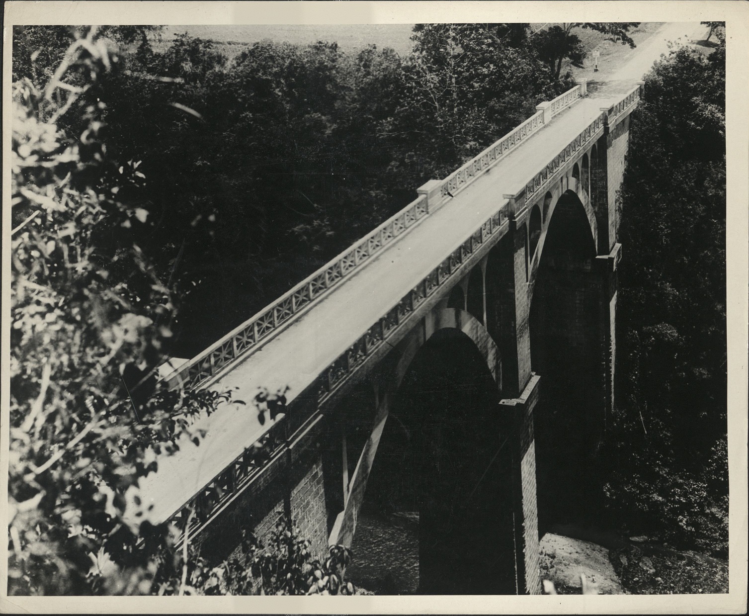 242. PHILIPPINES: Concrete arch bridge spans the Sabang River, in the Batangas Province.