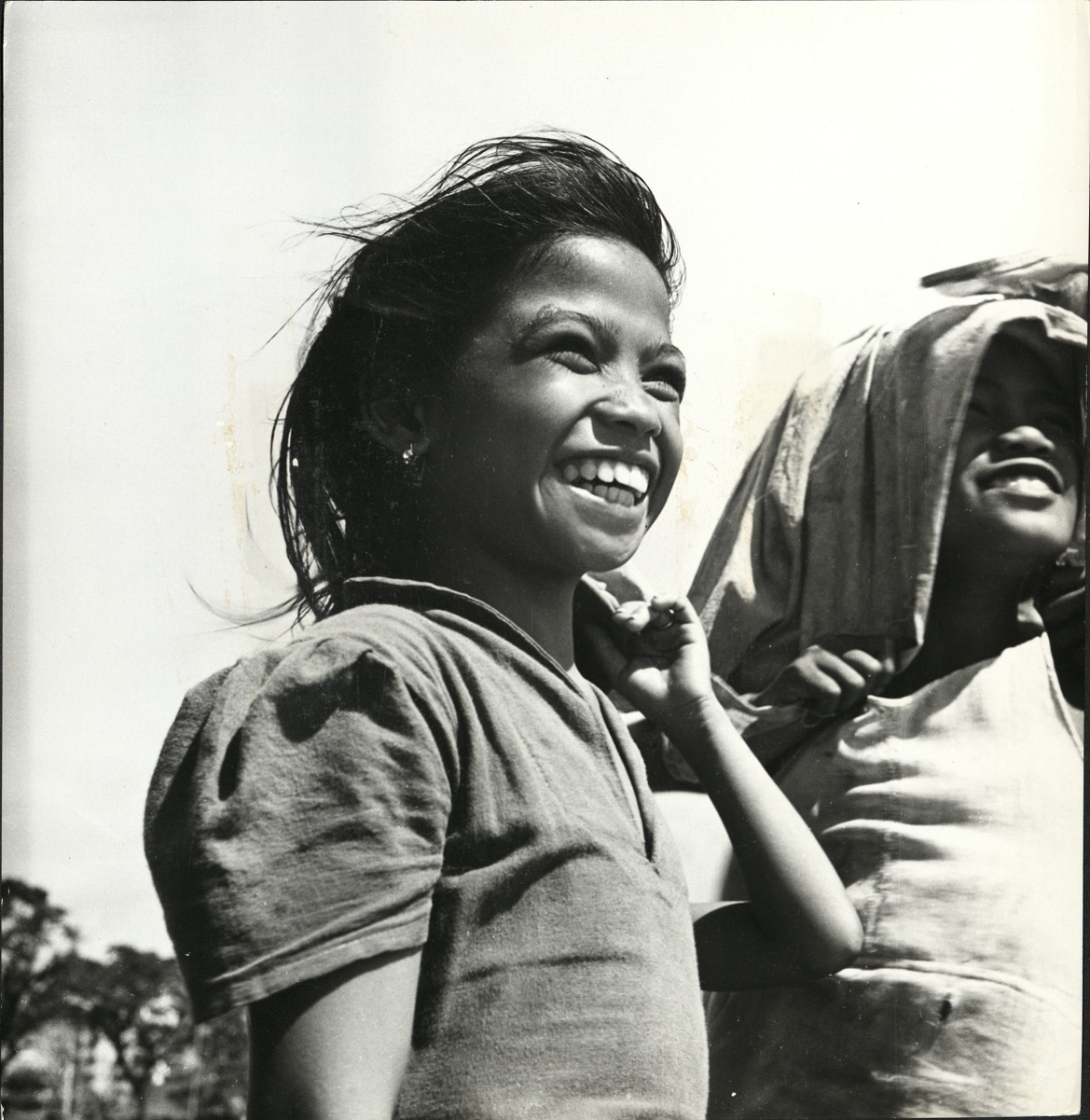 4. Young Filipinos are just kids (…) [girls smiling].