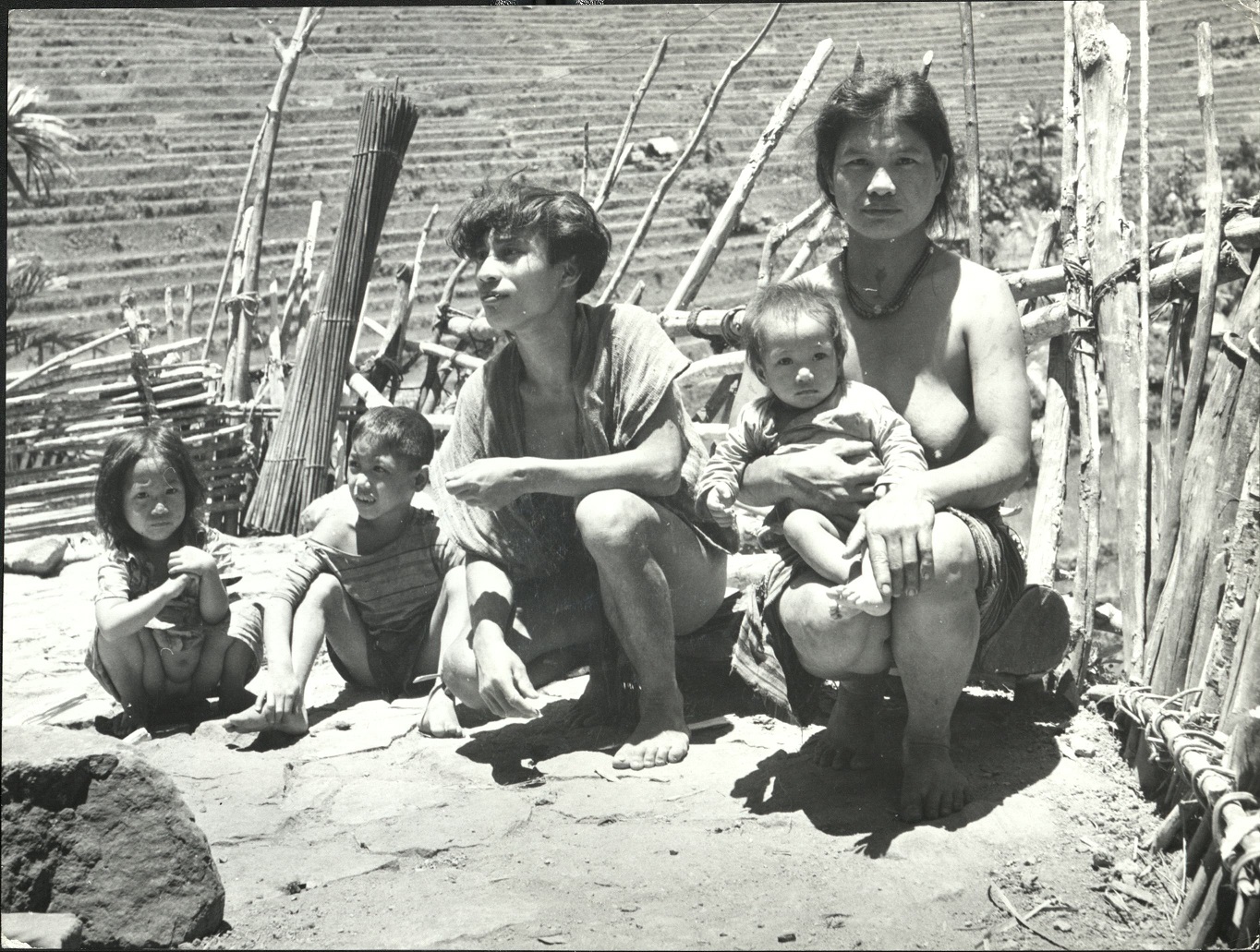 17. PHILIPPINES: Island of Luzon. Young family of mountain farmers of the Ifugao tribe in the rice-terraces of Banaue in the “Mountain [Ifugao] Province,” north of Manila.