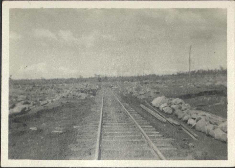 [Untitled – Restored railroad tracks after a flood or landslide].