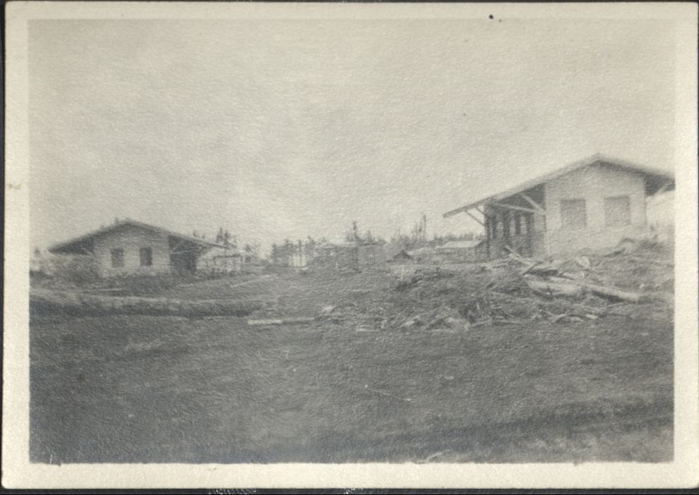 [Untitled – Train station (Baguio?) clogged with mud, trees, and debris after a flood or landslide].
