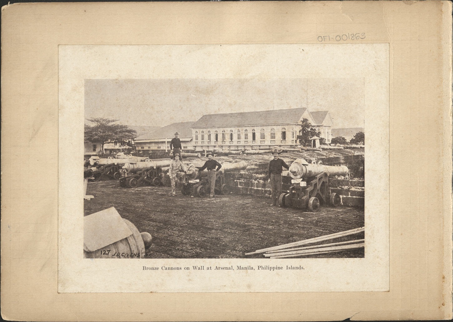 Bronze cannons on wall at arsenal, Manila, Philippine Islands.