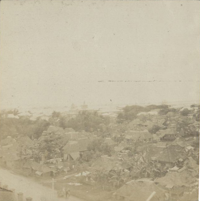 [Untitled – Philippine town with church in distance].