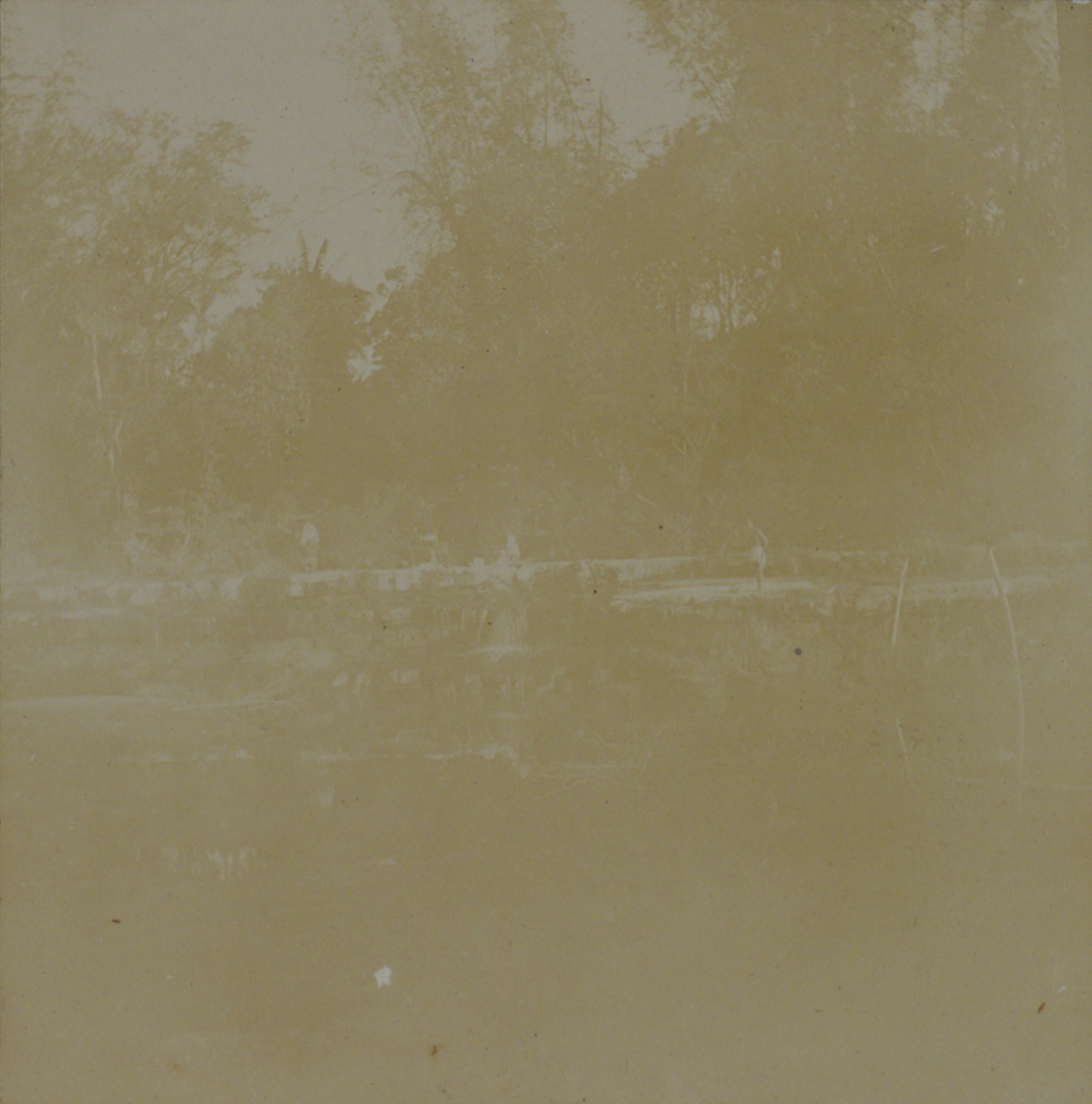 [Untitled – Filipinos standing on far riverbank].