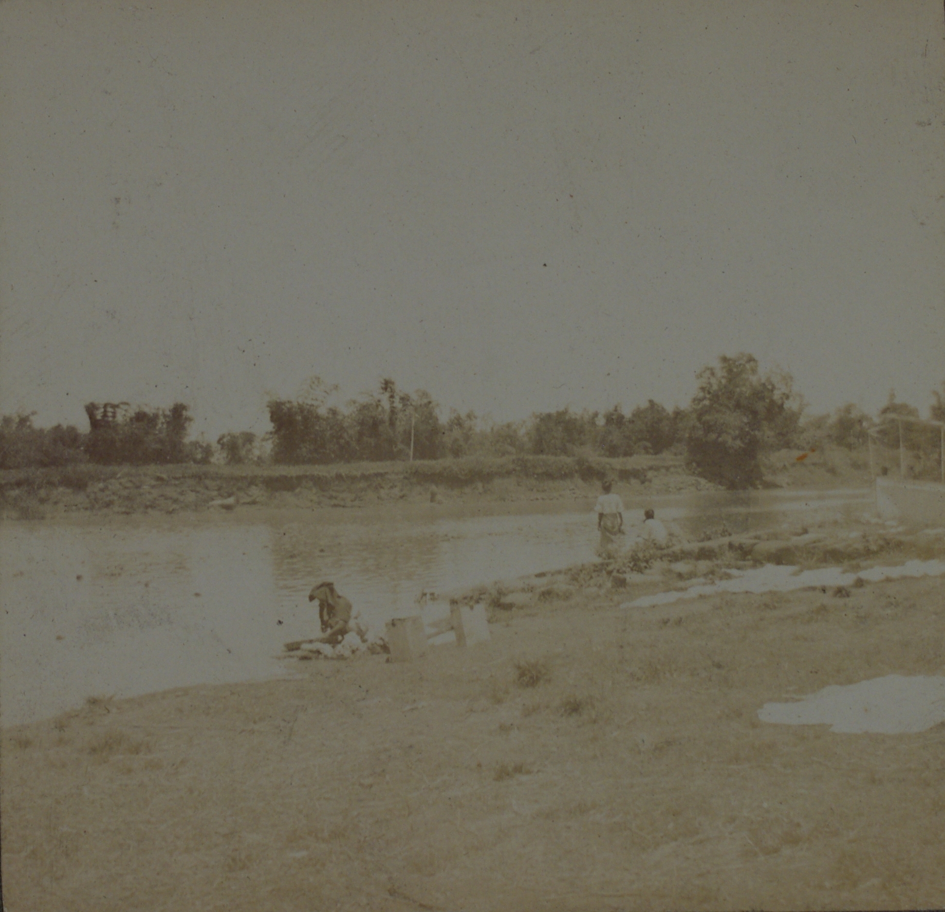 Big Bend [laundry in river].