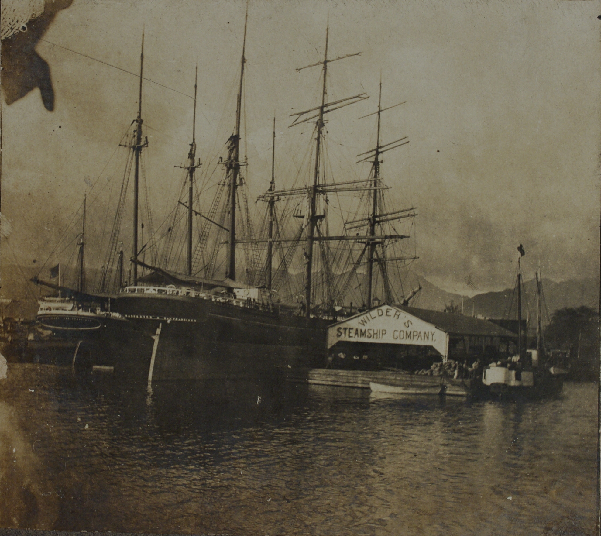 [Untitled – Sailing ship at Wilder’s Steamship Co. pier, Hawaii].