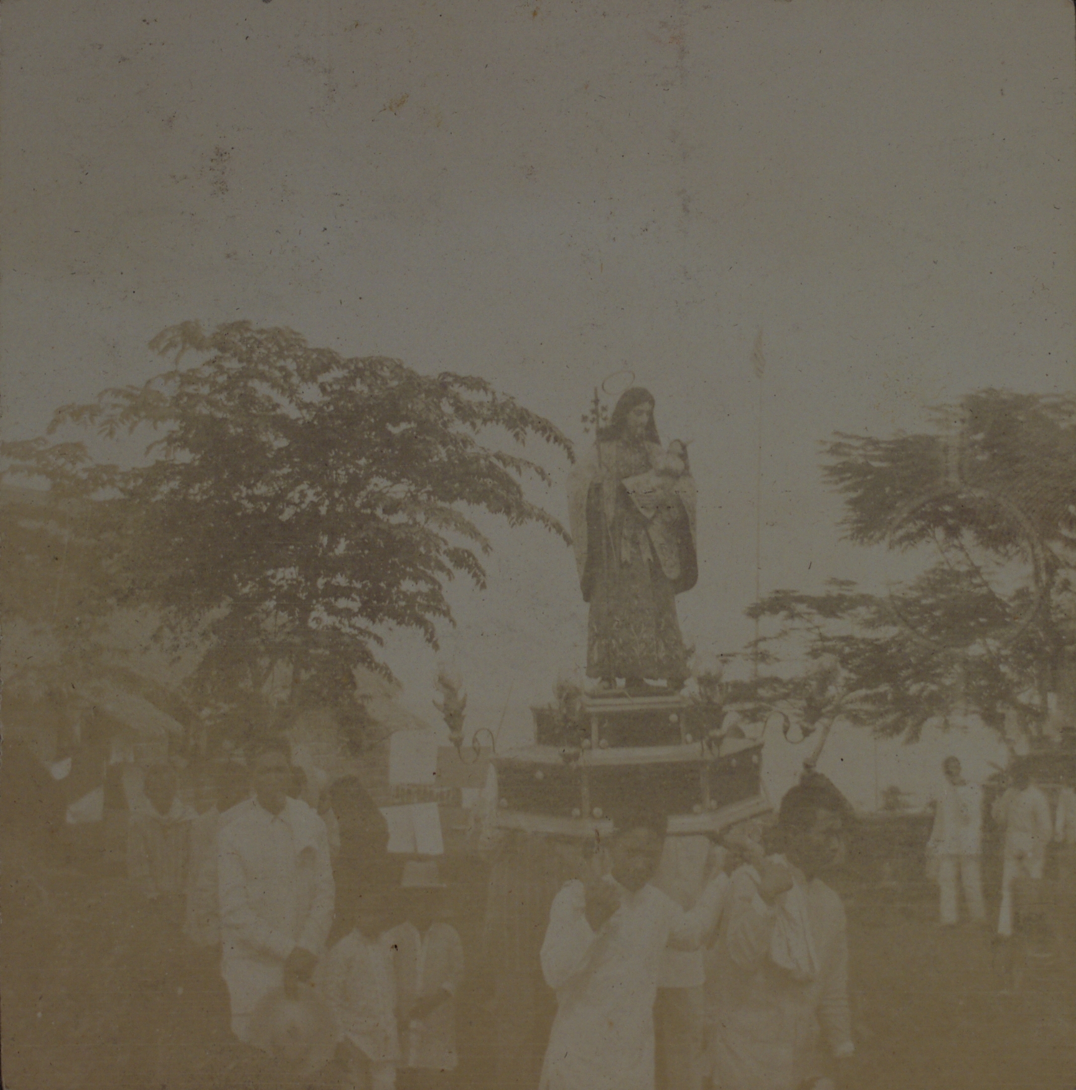 Imus [Statue carried in religious procession].