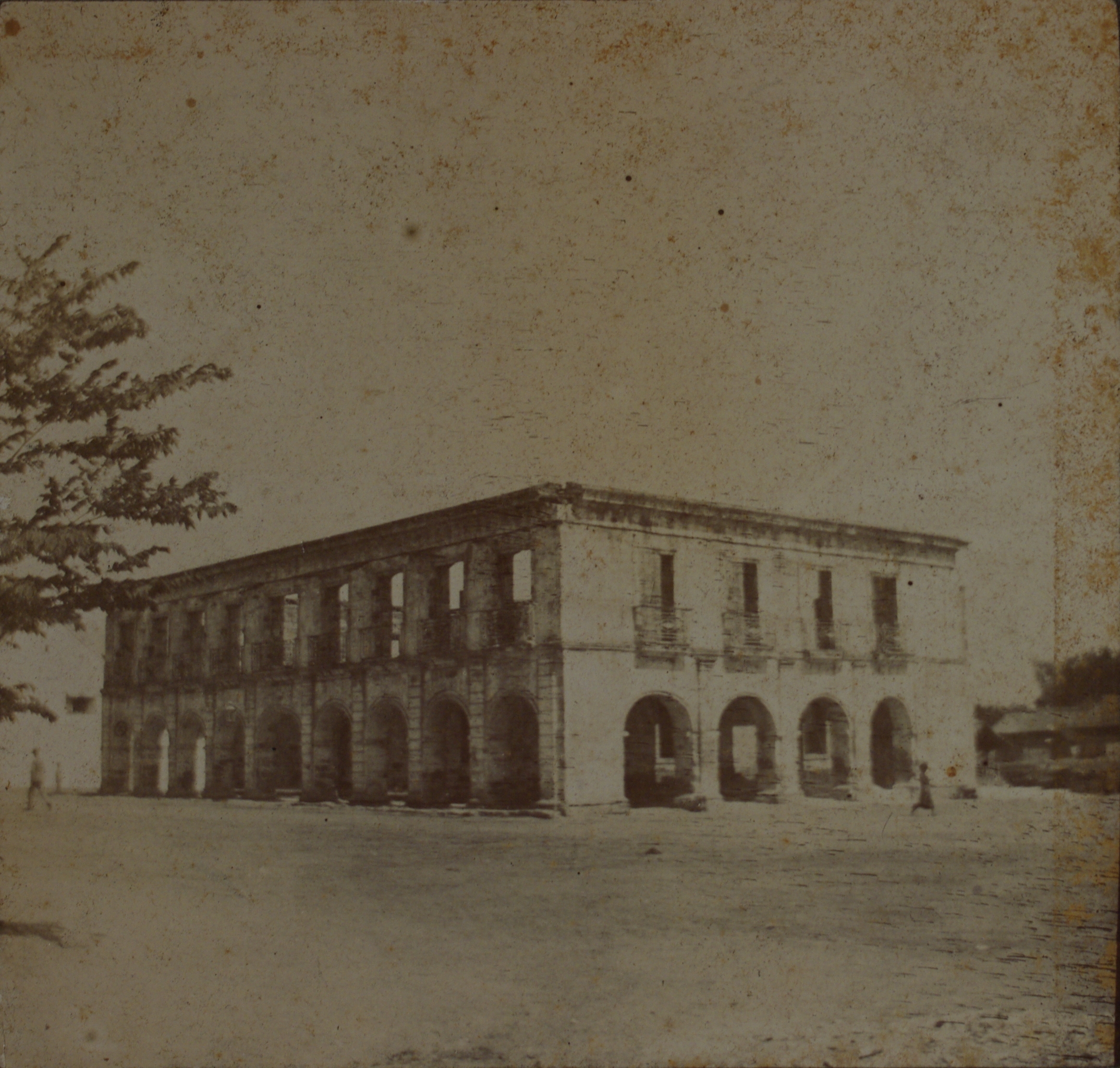 [Untitled – Roofless building shell, fire damaged?].