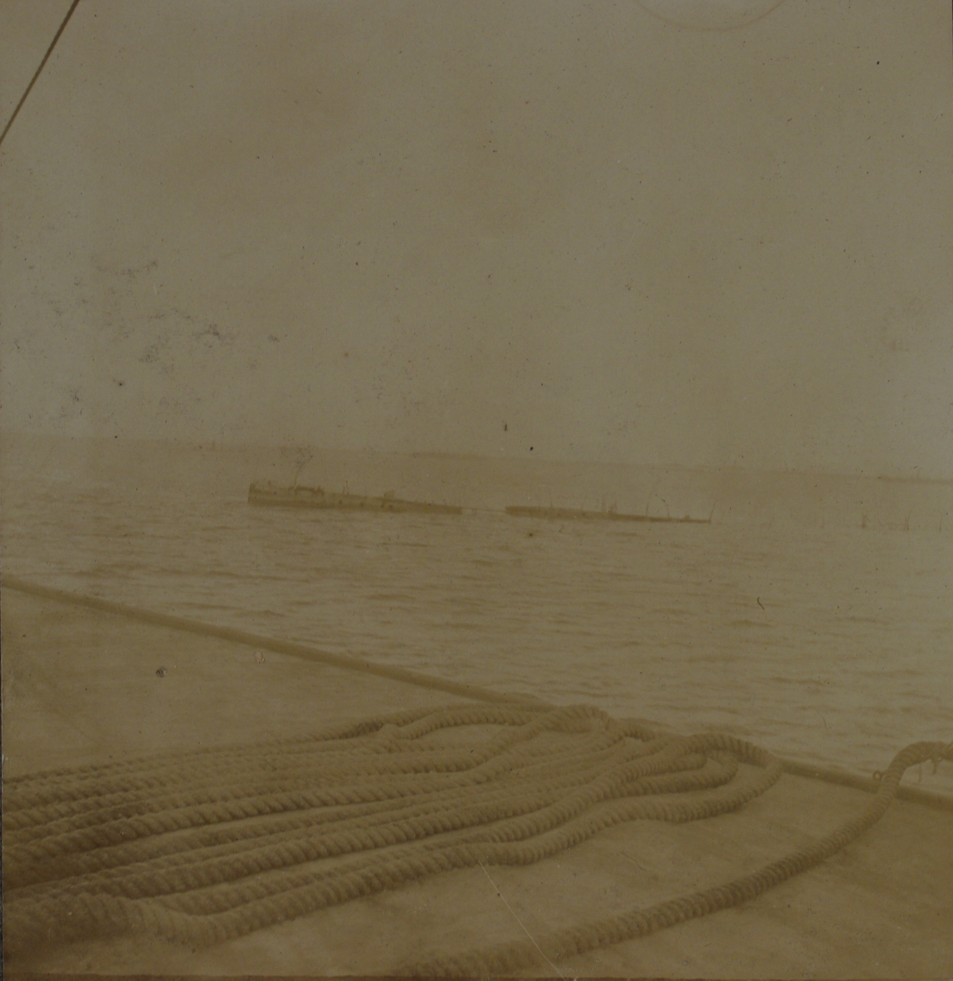 [Untitled – Sunken Spanish ship off pier, Cavite?].