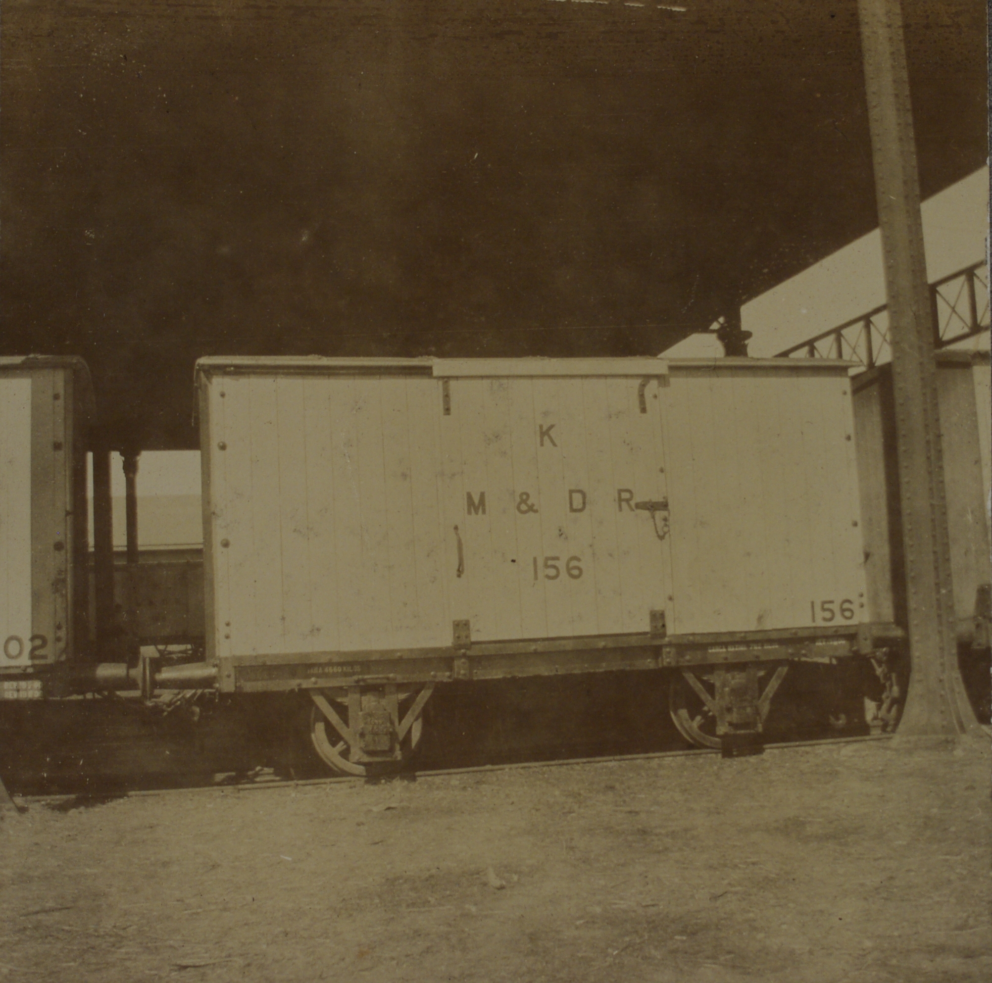 [Untitled – Manila & Dagupan Railroad boxcar].