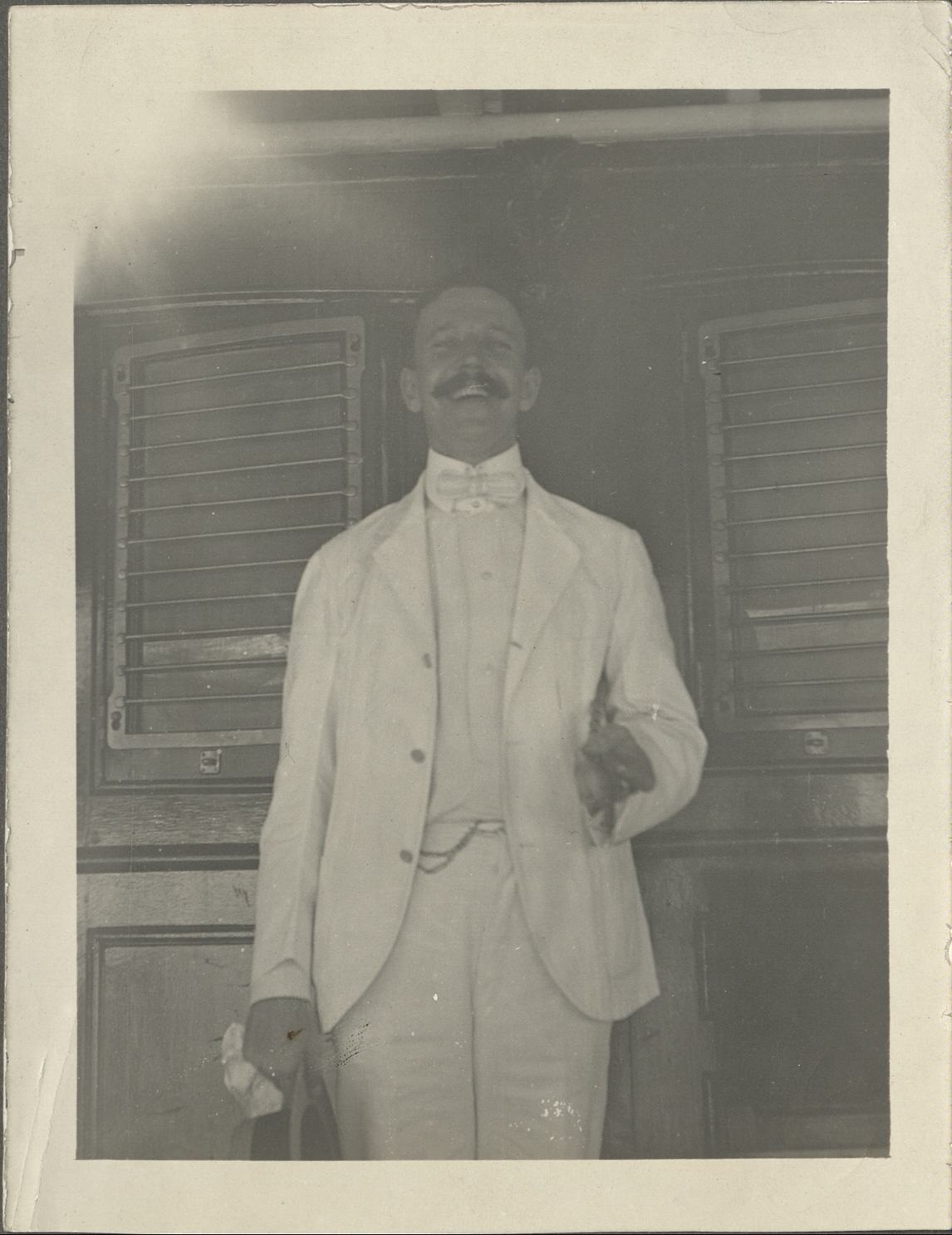 {Untitled – Expatriate man smiling].