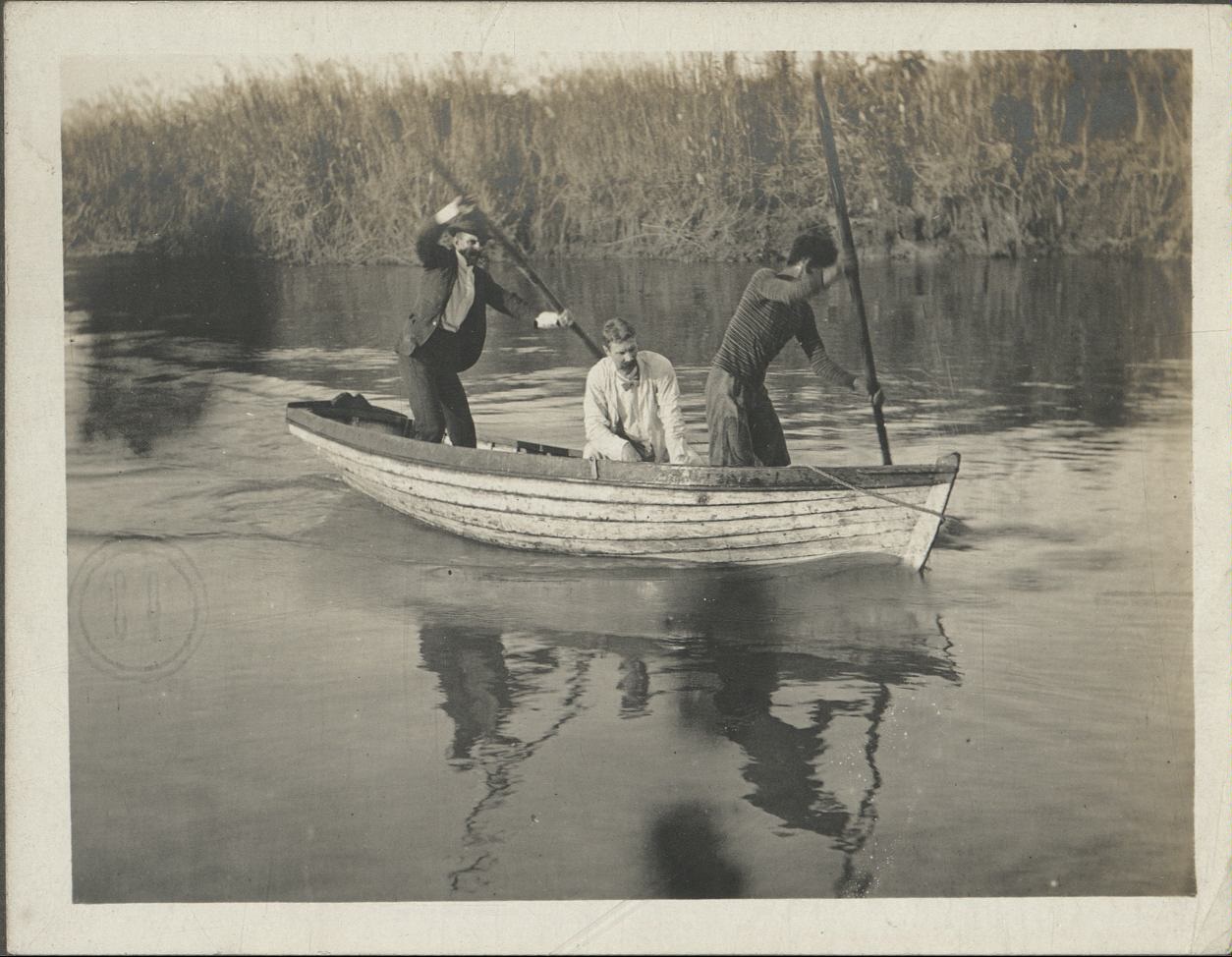 [Untitled – Poling a boat on a river].
