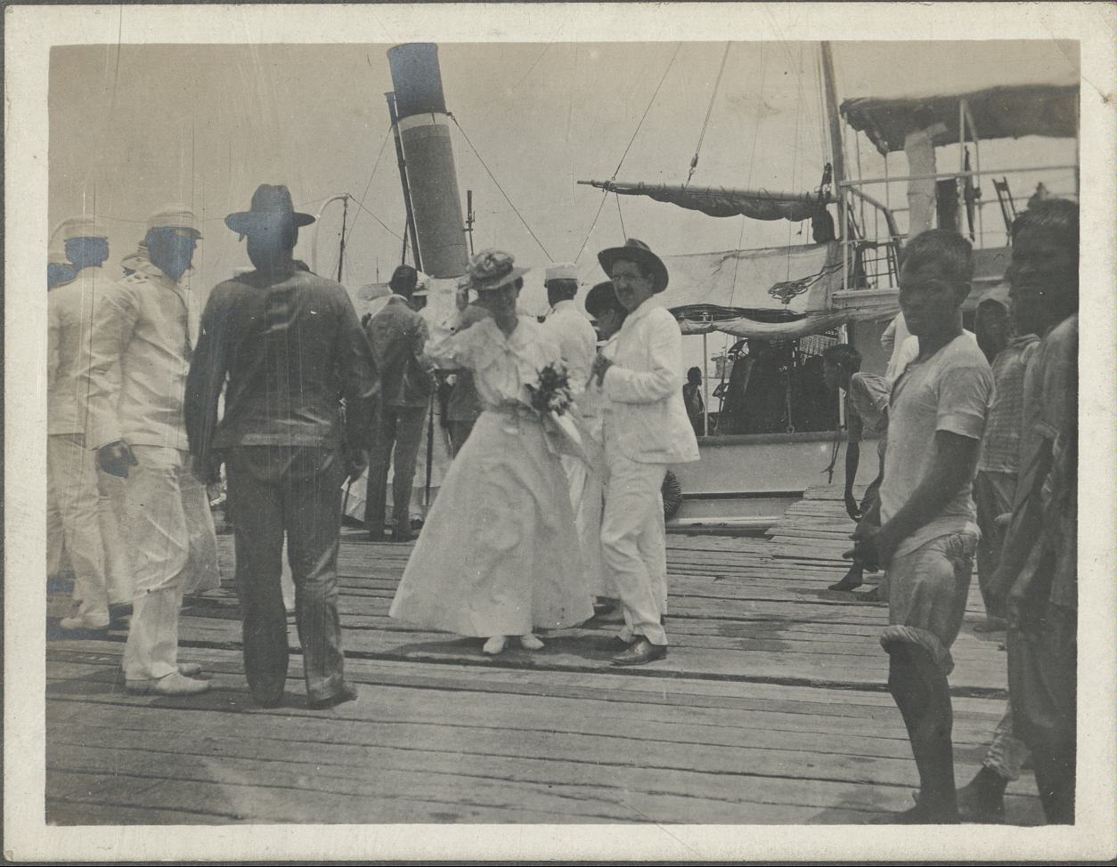 [Untitled – Passengers at a wood dock by a ship].