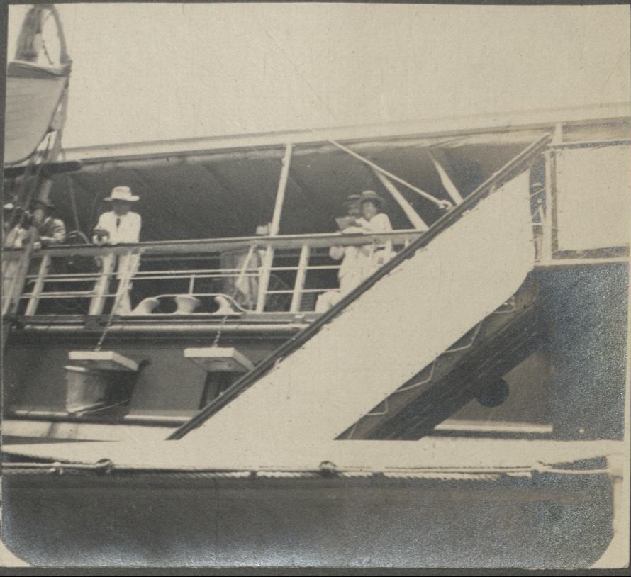 [Untitled – Expatriates on board an inter-island ship in port].