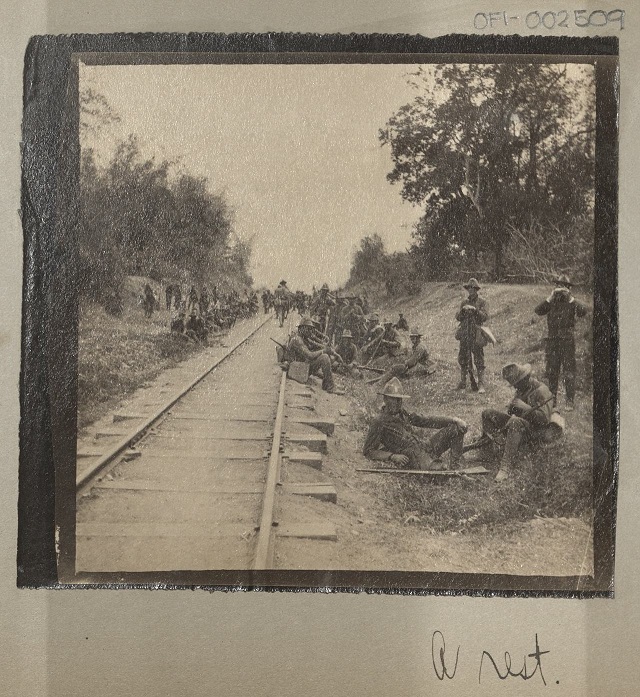 A rest [1st Nebraskans resting along the railroad line near Marilao, March 27, 1899.].