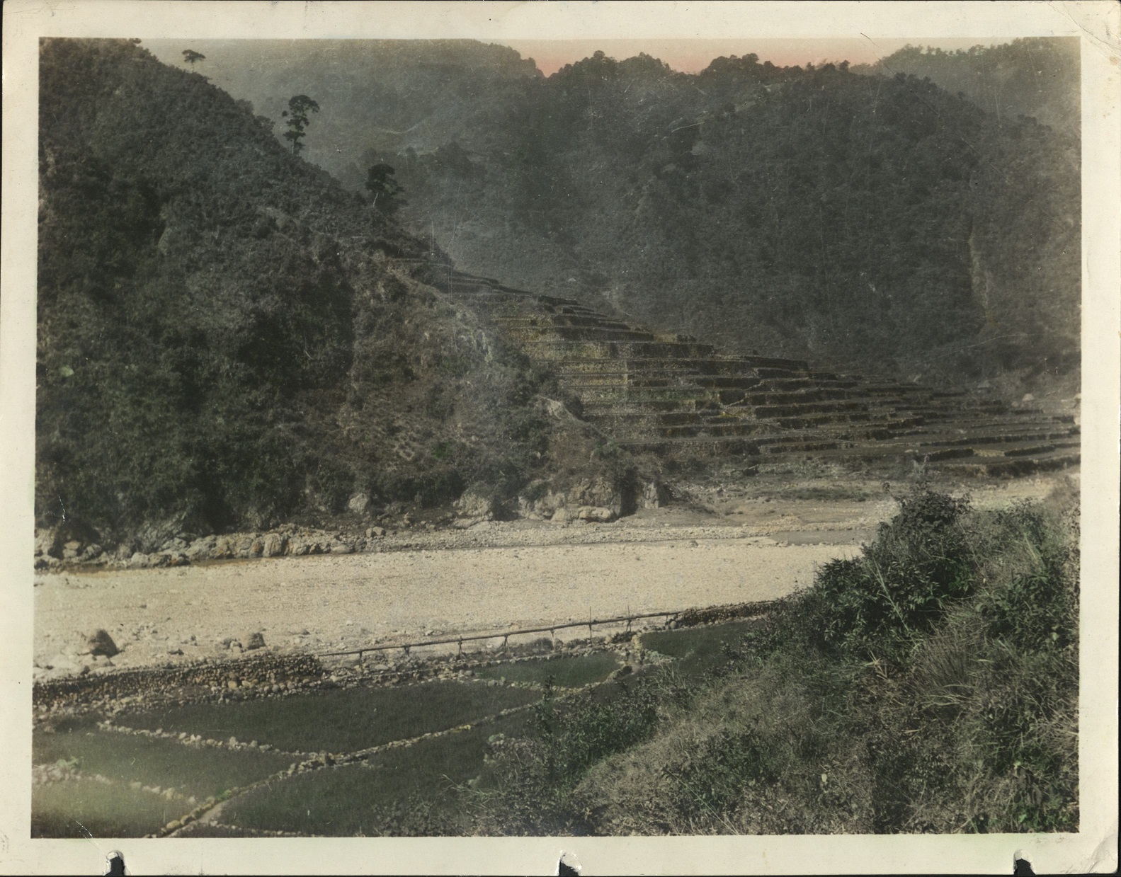 [Untitled – Gravel road through rice terraces].