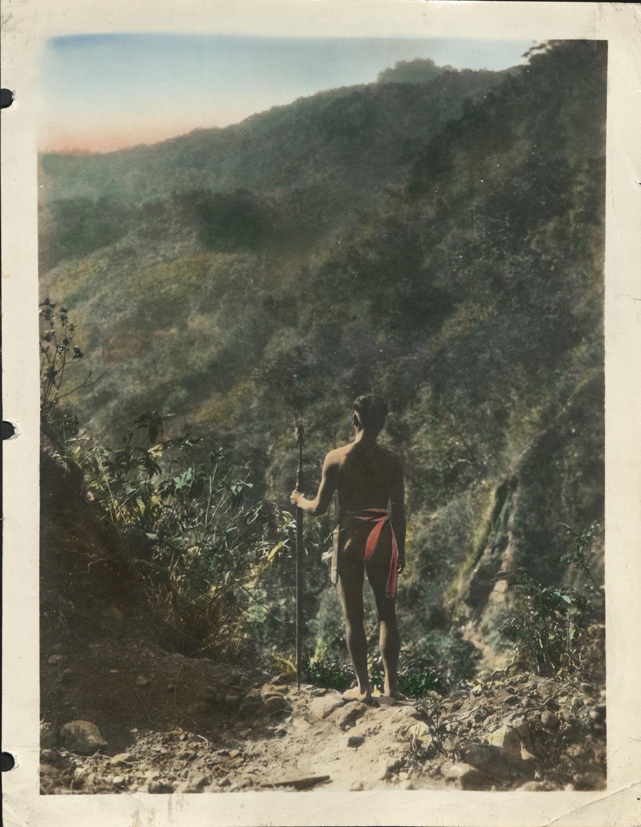 [Untitled – Mountain view with Igorot man standing on cliff edge].