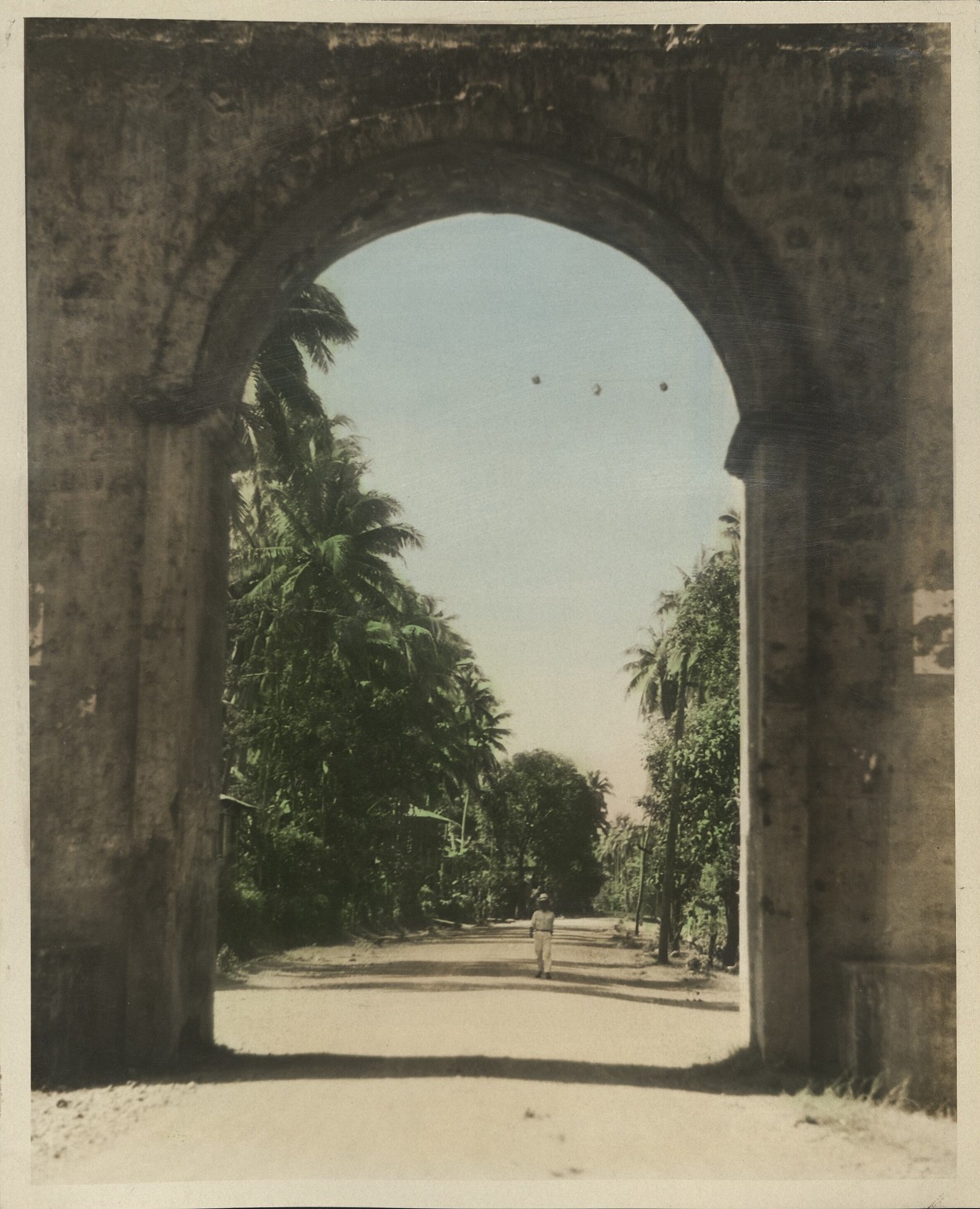 [Untitled – Stone gateway arch, possibly at Pagsanjan].