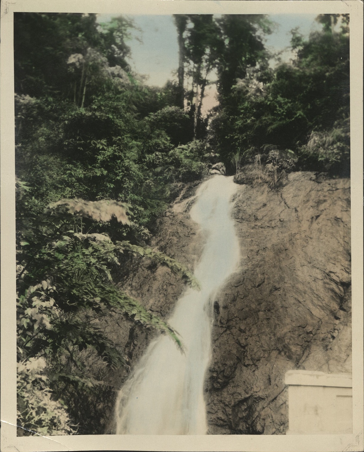[Untitled – A roadside waterfall].